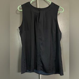 this is a blouse. the brand is Cabi, size small, color is dark navy blue/black.